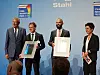 Bei der Verleihung des Stahl-Innovationspreis (v.l.): Arndt G. Kirchhoff (Kirchhoff Automotive Deutschland GmbH und Schirmherr der Veranstaltung),Gerhard Backes (Lehrstuhl Digital Additive Production DAP der RWTH Aachen University), Thomas Schopphoven (Fraunhofer ILT) und Moderatorin Dunja Hayali.