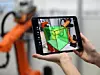 Die neue Software Kuka.MixedReality visualisiert die Umgebung von Roboterzellen live auf dem Smartphone und erleichtert so die Inbetriebnahme.