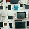 Old computers, digital tablets, mobile phones, many used electronic gadgets devices, broken household and appliances. Generative Ai