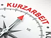 Ein Kompass mit Zeiger auf Kurzarbeit