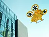 gelber Flugtaxi fliegt neben einem Hochhaus