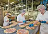 Ohne menschliche Beteiligung funktioniert die Produktion von Tiefkühlpizzas auch im neuen Nestlé