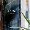 Auf einer Wand steht PSA.