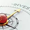 Ein chinesischer Kompass zeigt in Richtung Investitionen