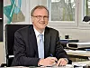 Prof. Dr.-Ing. Dirk Biermann von der TU Dortmund sitzt am Schreibtisch