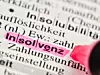 Insolvenz mit pinken Marker markiert in Wörterbuch