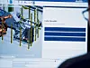 Bildschirm mit 3D-Konstruktionsmodell und eingeblendeter Softwareoberfläche.
